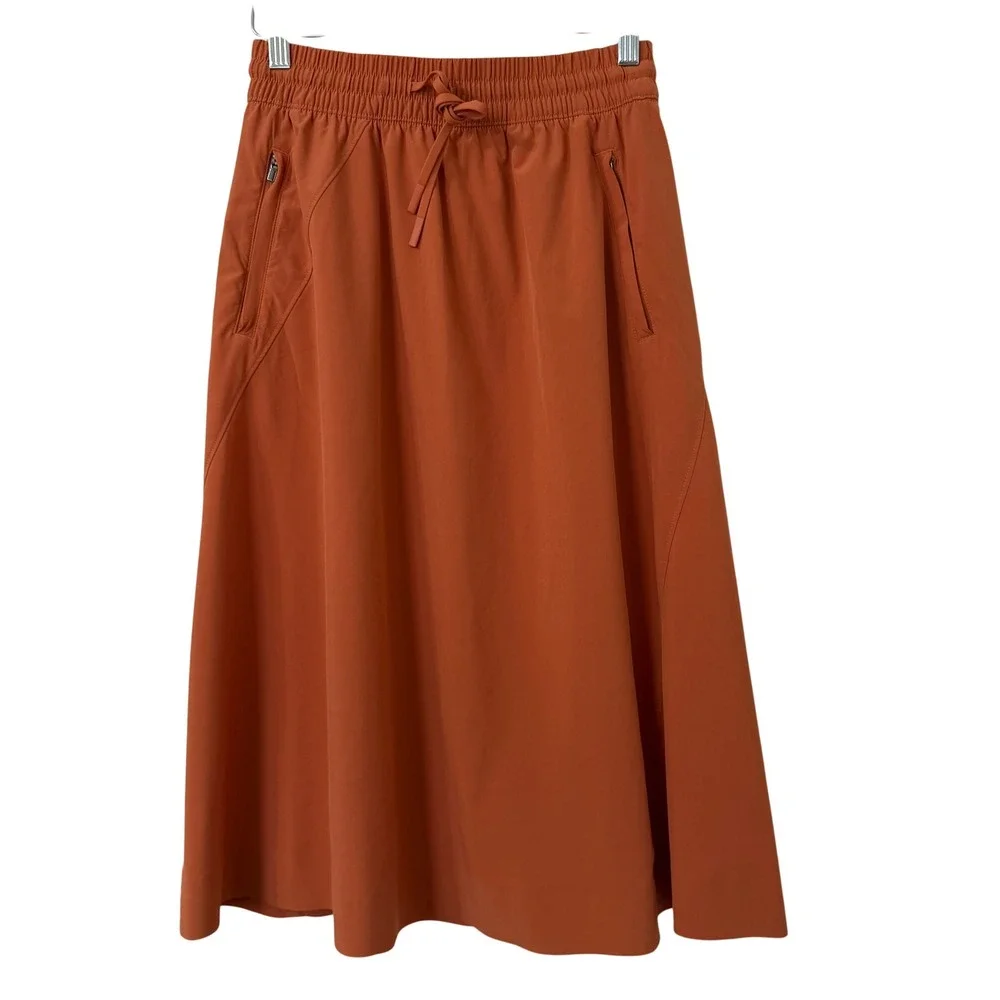 Athleta A-Line Midi Skirt 4 Womens Burnt Orange Zipper Pockets Elastic Earthy